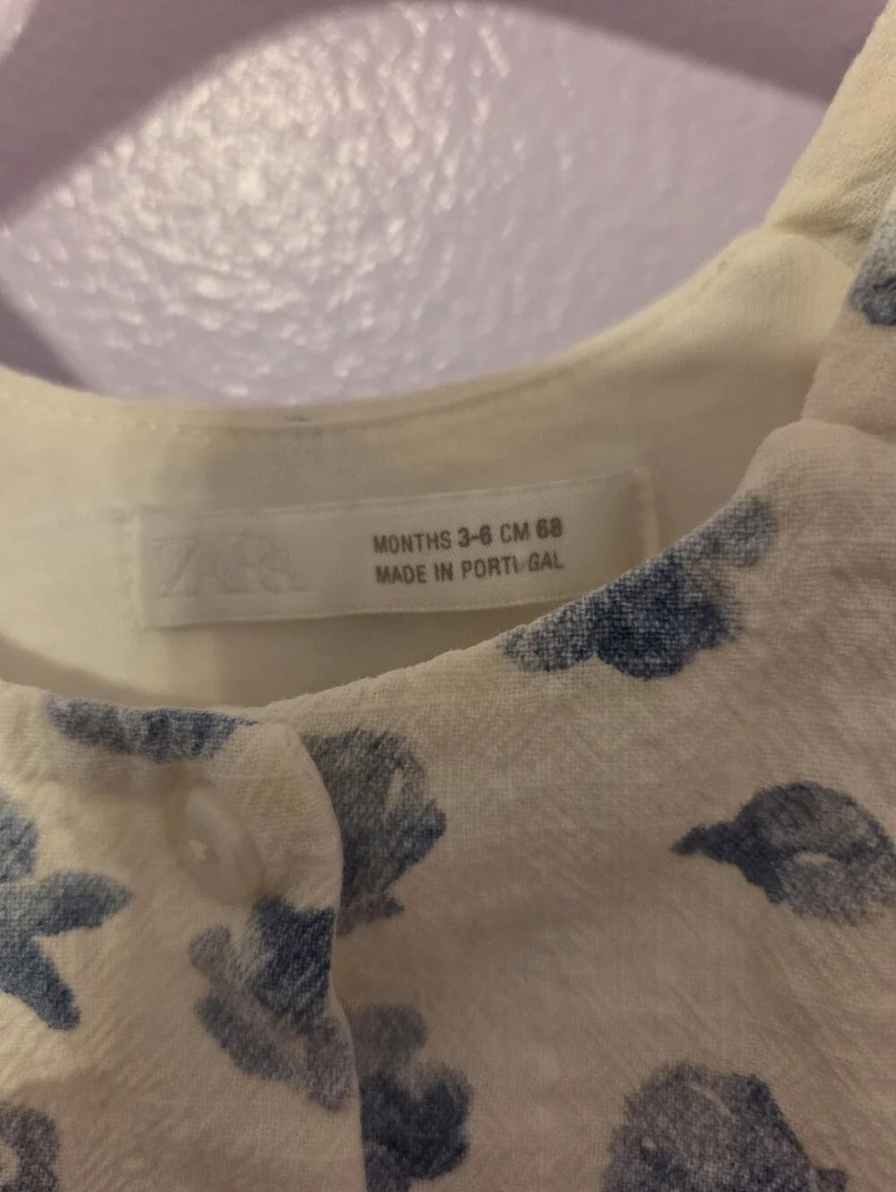 Zara baby girl's white linen dress with a blue marine print